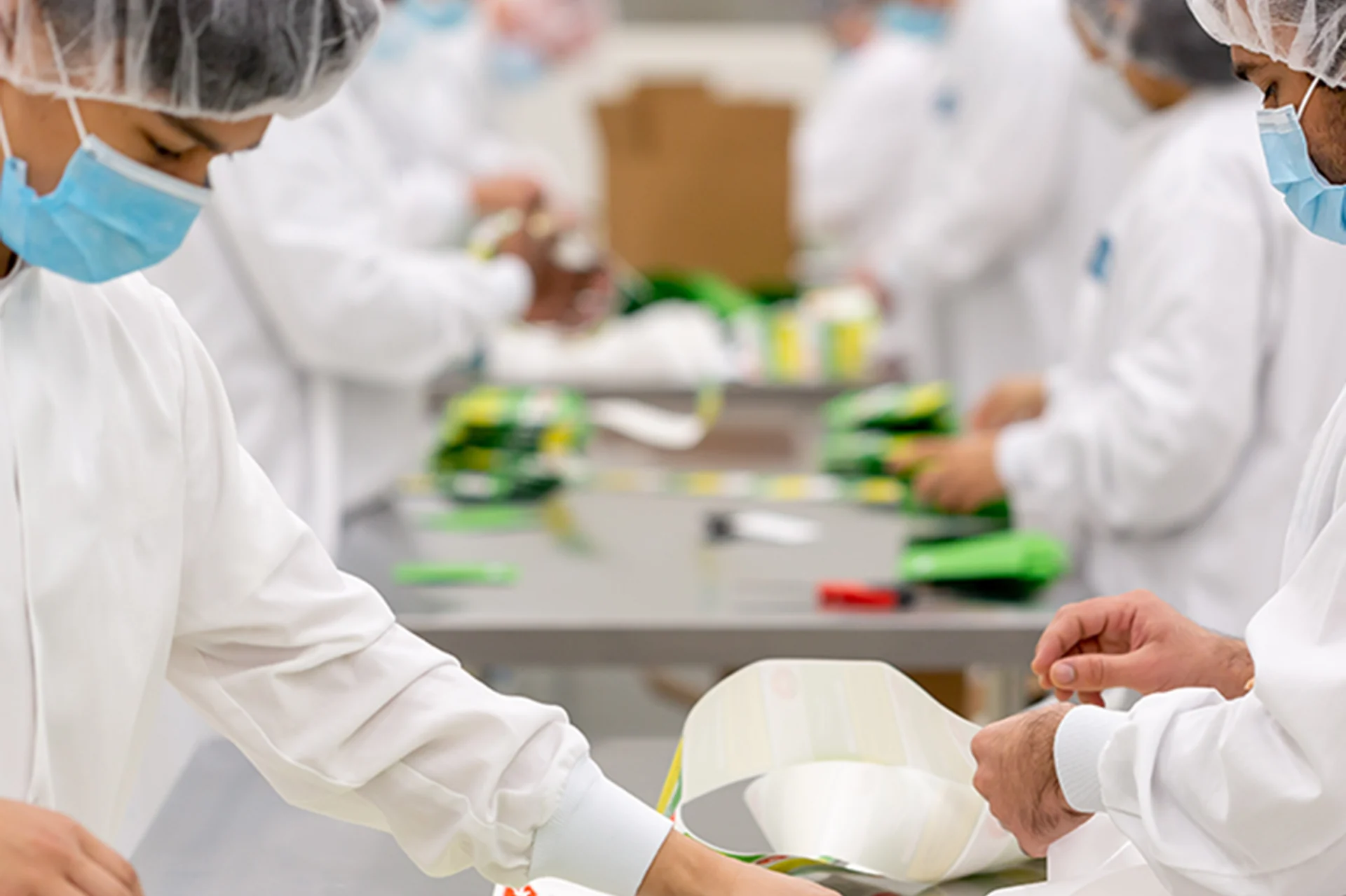 Peak team members preparing packaged products together