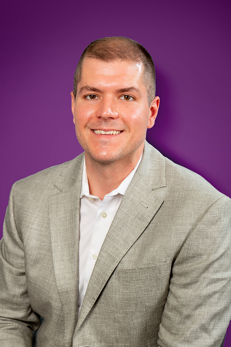 Portrait of Justin Binder, PhD